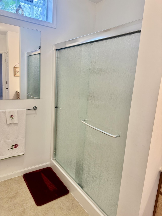 870 Dalton Dr, Rose City, MI 48654 - full bathroom featuring a shower stall and tile patterned floors