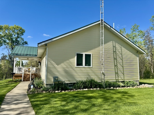 870 Dalton Dr, Rose City, MI 48654 - view of property exterior featuring a lawn and a porch