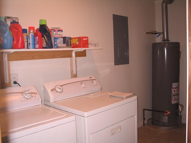 5198 Troopers Trl, Frederic, MI 49733 - laundry room featuring gas water heater, washing machine and dryer, electric panel, and tile patterned flooring