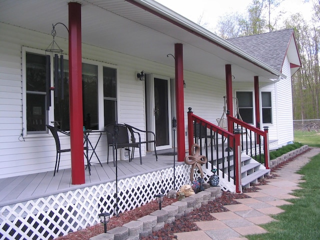 5198 Troopers Trl, Frederic, MI 49733 - deck with covered porch