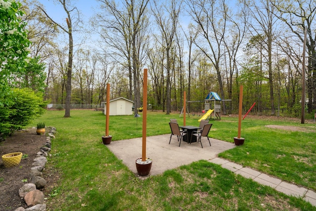 6727 Fisher Woods Rd, Indian River, MI 49749 - view of yard with a playground and a patio area