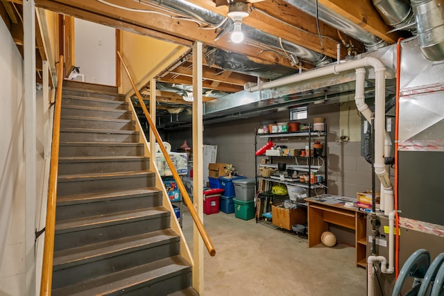 6727 Fisher Woods Rd, Indian River, MI 49749 - unfinished basement featuring stairway