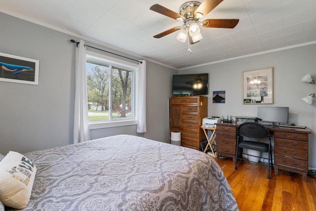 6727 Fisher Woods Rd, Indian River, MI 49749 - bedroom featuring crown molding, hardwood / wood-style floors, and a ceiling fan