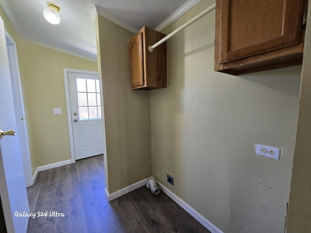 72 Chelsey Ln, Cheboygan, MI 49721 - laundry room with hookup for an electric dryer, cabinet space, crown molding, dark wood finished floors, and a textured ceiling