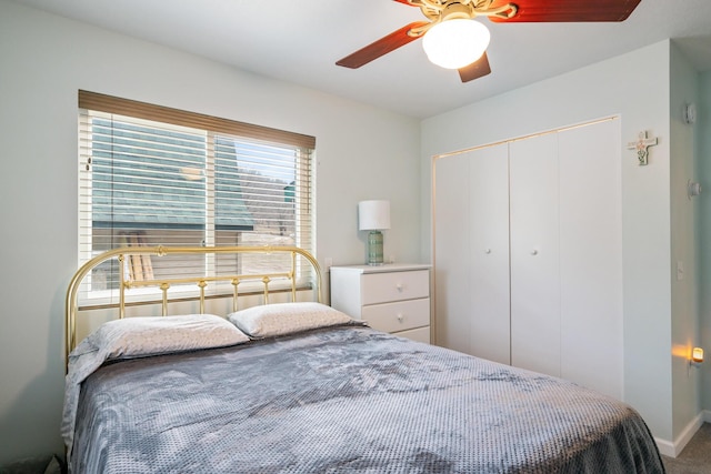 2286 Maxwell Rd, Petoskey, MI 49770 - carpeted bedroom featuring a closet, baseboards, and ceiling fan