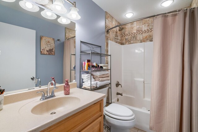 2286 Maxwell Rd, Petoskey, MI 49770 - full bath with shower / bath combo, vanity, and toilet