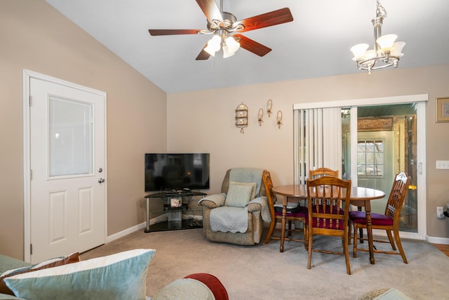 2286 Maxwell Rd, Petoskey, MI 49770 - living area featuring a chandelier, ceiling fan, baseboards, and carpet