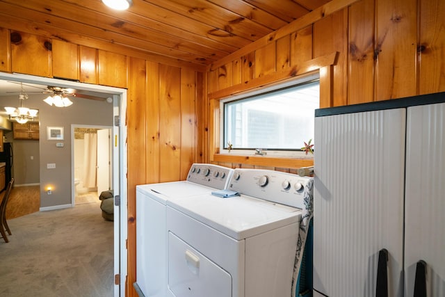 2286 Maxwell Rd, Petoskey, MI 49770 - washroom with independent washer and dryer, wood ceiling, light carpet, baseboards, and wood walls