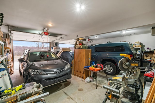 2286 Maxwell Rd, Petoskey, MI 49770 - garage featuring a garage door opener