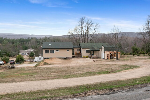 2286 Maxwell Rd, Petoskey, MI 49770 - view of front of house with a mountain view