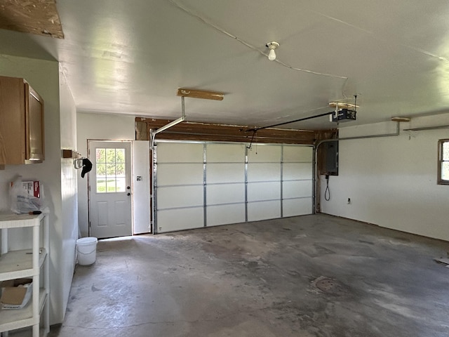 6870 N Spruce Rd, Spruce, MI 48762 - garage with a garage door opener