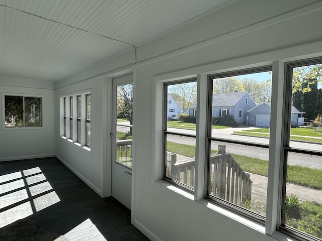 1033 S First Ave, Alpena, MI 49707 - unfurnished sunroom with a residential view