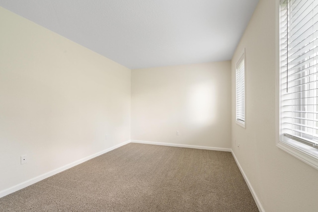 2067 Woods Ln, Petoskey, MI 49770 - unfurnished room with carpet and baseboards