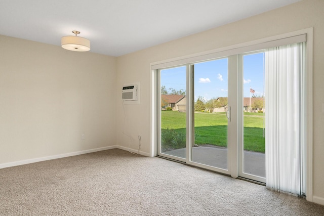 2067 Woods Ln, Petoskey, MI 49770 - spare room with carpet flooring, an AC wall unit, and baseboards
