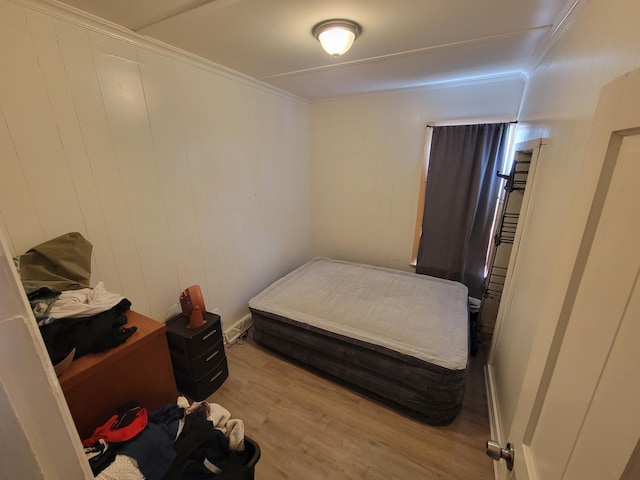 420 W Miller St, Alpena, MI 49707 - bedroom with wood finished floors