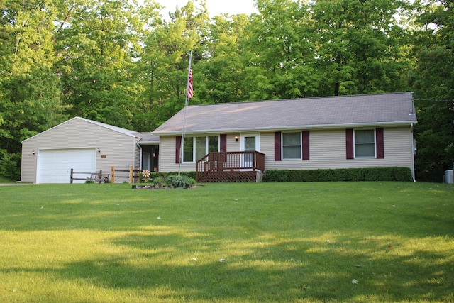 2426 W Park Rd, Mio, MI 48647 - ranch-style house with a garage, a front lawn, and roof with shingles