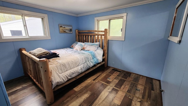 610 Old Trail Dr, Houghton Lake, MI 48629 - bedroom featuring ornamental molding, dark wood-style floors, and multiple windows