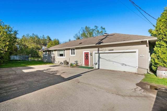 6620 N Straits Hwy, Cheboygan, MI 49721 - ranch-style home with driveway and an attached garage