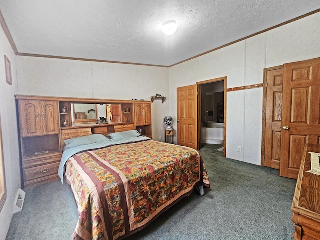 5844 Keipinger Trl, Grayling, MI 49738 - bedroom with ornamental molding, dark carpet, a textured ceiling, a decorative wall, and ensuite bathroom