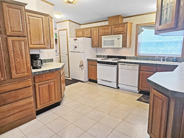 5844 Keipinger Trl, Grayling, MI 49738 - kitchen featuring white appliances, a sink, crown molding, and brown cabinets