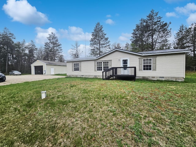 5844 Keipinger Trl, Grayling, MI 49738 - manufactured / mobile home with crawl space, driveway, a garage, an outdoor structure, and a front lawn