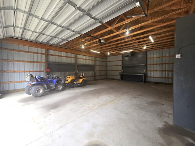 5844 Keipinger Trl, Grayling, MI 49738 - garage featuring a garage door opener