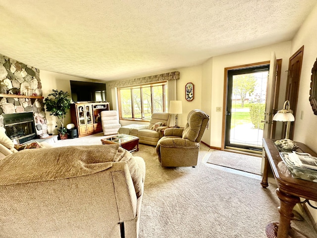 173 N Addison St, Alpena, MI 49707 - carpeted living room featuring a textured ceiling and a stone fireplace