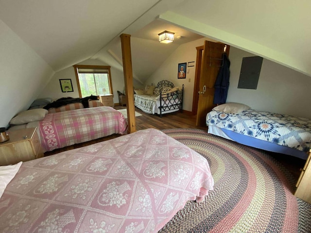 5626 Smith Rd, Lewiston, MI 49756 - bedroom featuring wood finished floors, lofted ceiling, and electric panel