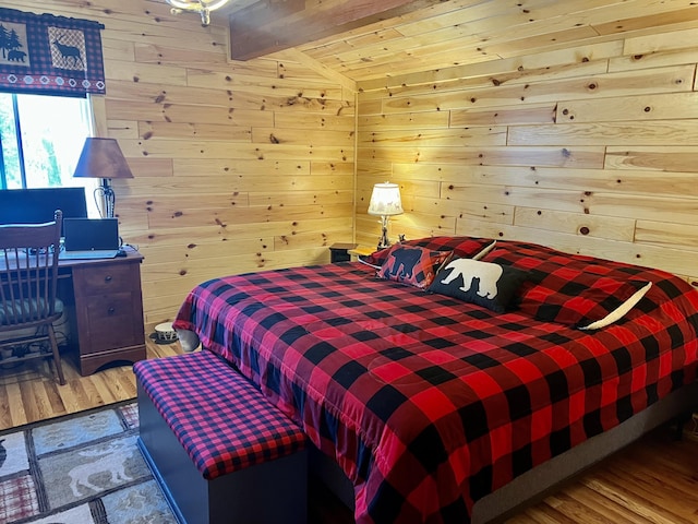 468 Pine Oak Trl, Grayling, MI 49738 - bedroom featuring wooden walls and wood finished floors