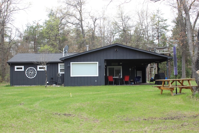 468 Pine Oak Trl, Grayling, MI 49738 - view of front of home with a front yard