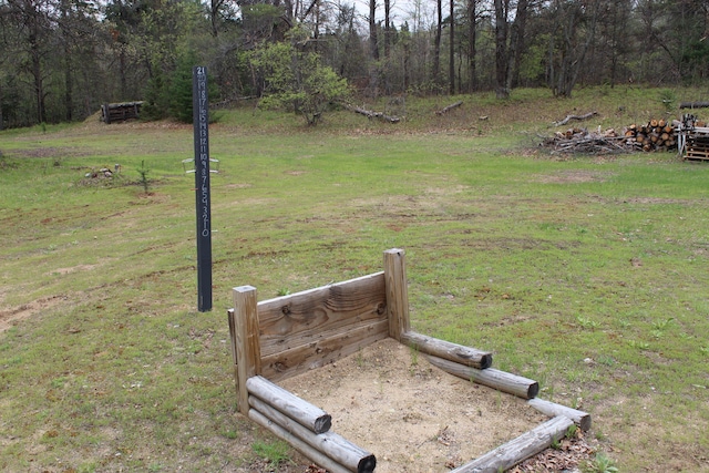 468 Pine Oak Trl, Grayling, MI 49738 - view of grassy yard featuring a forest view
