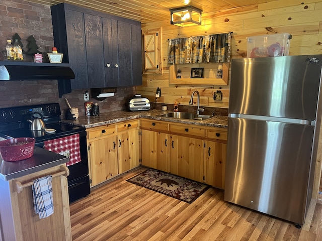 468 Pine Oak Trl, Grayling, MI 49738 - kitchen with freestanding refrigerator, black electric range, open shelves, range hood, and a sink