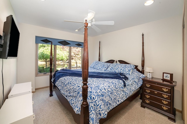 118 Harbor Ct, Houghton Lake, MI 48629 - bedroom featuring light carpet, baseboards, and a ceiling fan