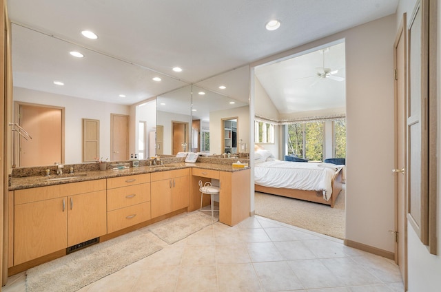 118 Harbor Ct, Houghton Lake, MI 48629 - bathroom featuring double vanity, a ceiling fan, recessed lighting, tile patterned flooring, and ensuite bath