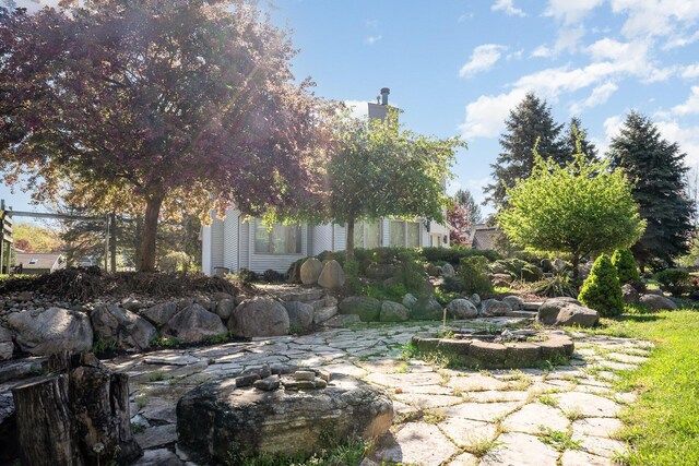 118 Harbor Ct, Houghton Lake, MI 48629 - view of yard featuring a patio