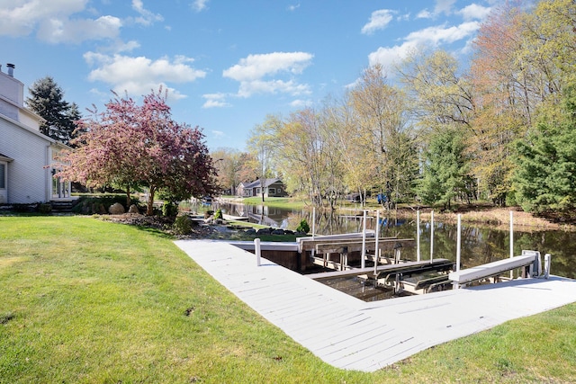 118 Harbor Ct, Houghton Lake, MI 48629 - dock area with boat lift, a water view, and a yard