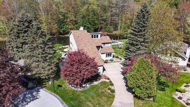 118 Harbor Ct, Houghton Lake, MI 48629 - view of subject property featuring a forest