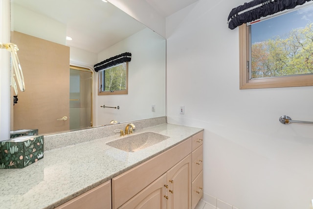 118 Harbor Ct, Houghton Lake, MI 48629 - full bath with vanity, a shower with door, and recessed lighting