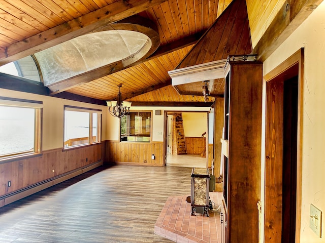 2215 N Partridge Point Rd, Alpena, MI 49707 - hall with a baseboard radiator, a chandelier, wood ceiling, wooden walls, and wood finished floors