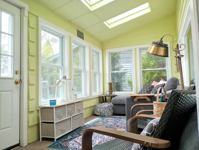 12243 E Houghton Lake Dr, Houghton Lake, MI 48629 - sunroom featuring lofted ceiling, a skylight, and carpet flooring
