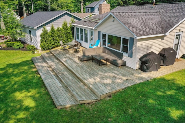 12243 E Houghton Lake Dr, Houghton Lake, MI 48629 - deck featuring a yard, an outdoor hangout area, and a sunroom