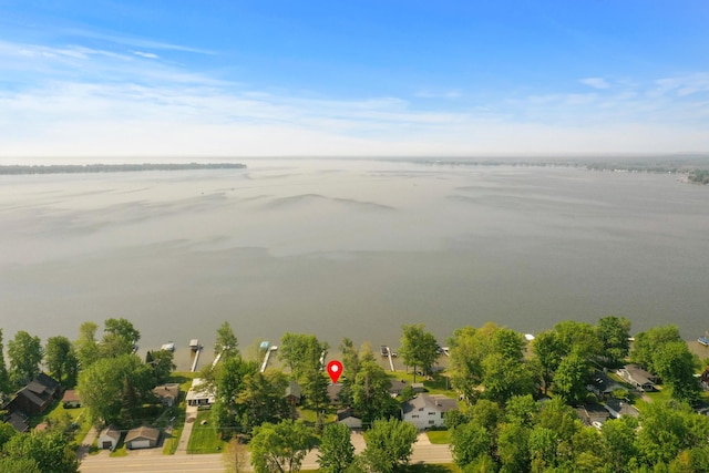 12243 E Houghton Lake Dr, Houghton Lake, MI 48629 - aerial perspective of suburban area with a large body of water