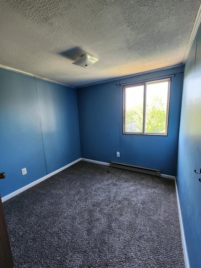 8881 Artesia Beach Rd, Saint Helen, MI 48656 - unfurnished room featuring baseboard heating, dark colored carpet, a textured ceiling, baseboards, and ornamental molding