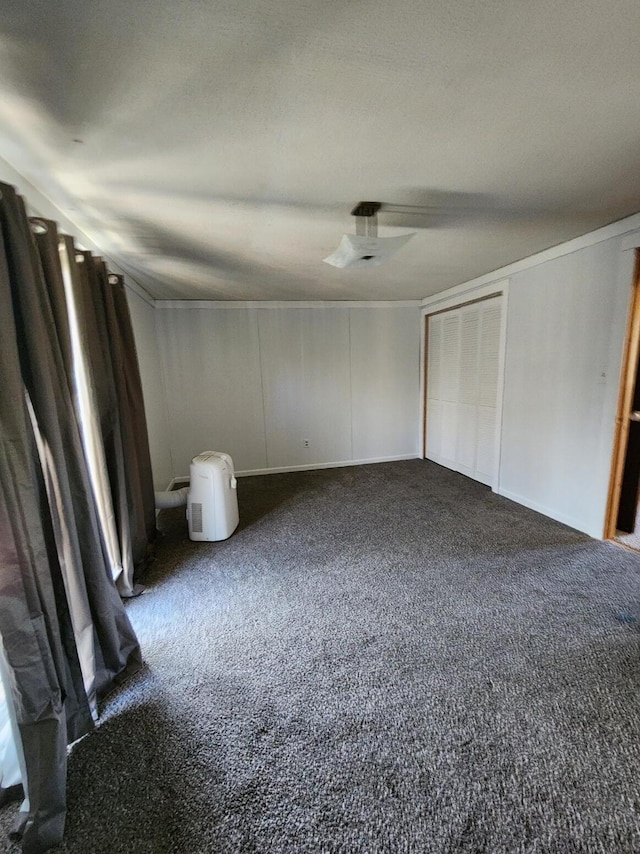 8881 Artesia Beach Rd, Saint Helen, MI 48656 - unfurnished bedroom featuring carpet flooring