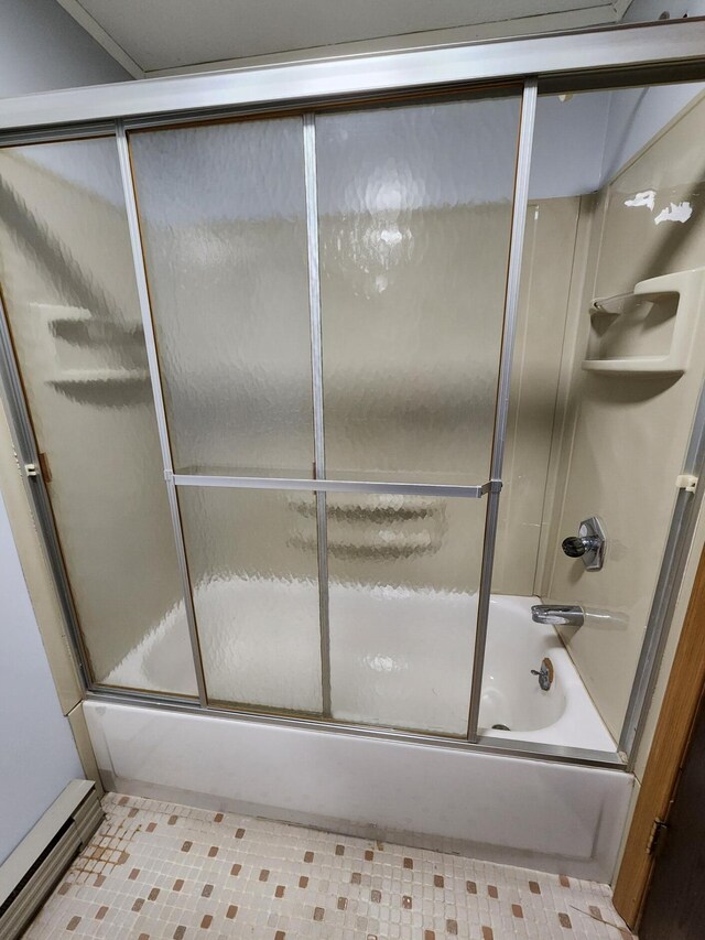 8881 Artesia Beach Rd, Saint Helen, MI 48656 - bathroom with baseboard heating and bath / shower combo with glass door