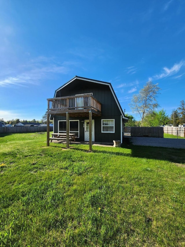 8881 Artesia Beach Rd, Saint Helen, MI 48656 - rear view of house with a wooden deck