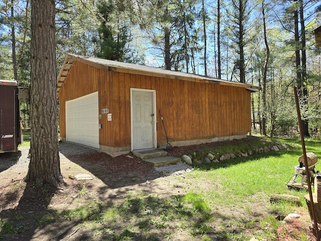4247 Racoon Trl, Lincoln, MI 48742 - view of outdoor structure with driveway