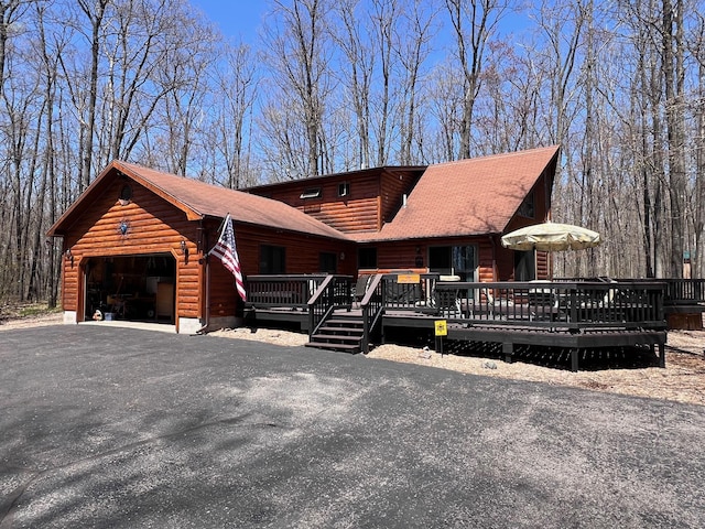 view of front of property featuring a deck