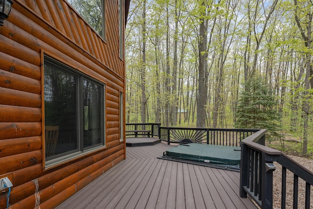 215 Garfield Blvd, Roscommon, MI 48653 - wooden terrace with a view of trees