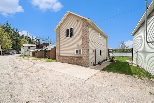 13042 Silver Lake Resort Rd, Wolverine, MI 49799 - view of property exterior featuring brick siding